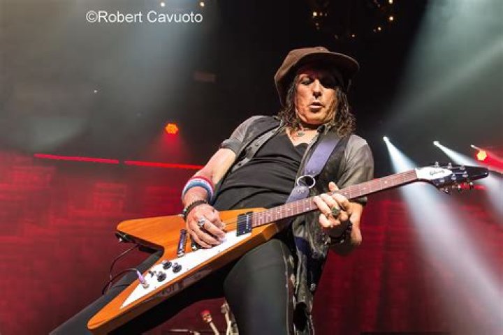 Does Alice Cooper Play Guitar?